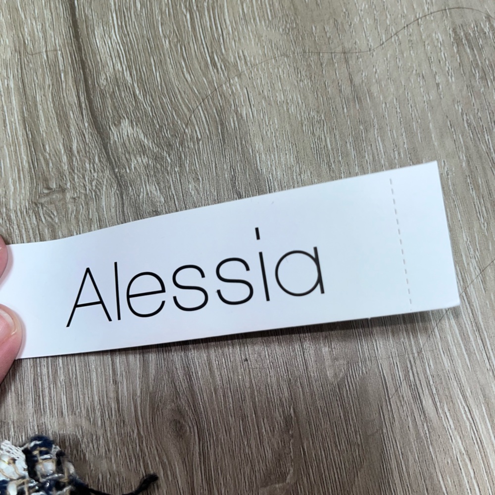 Alessia tweed clutch crossbody bag with gold chain.